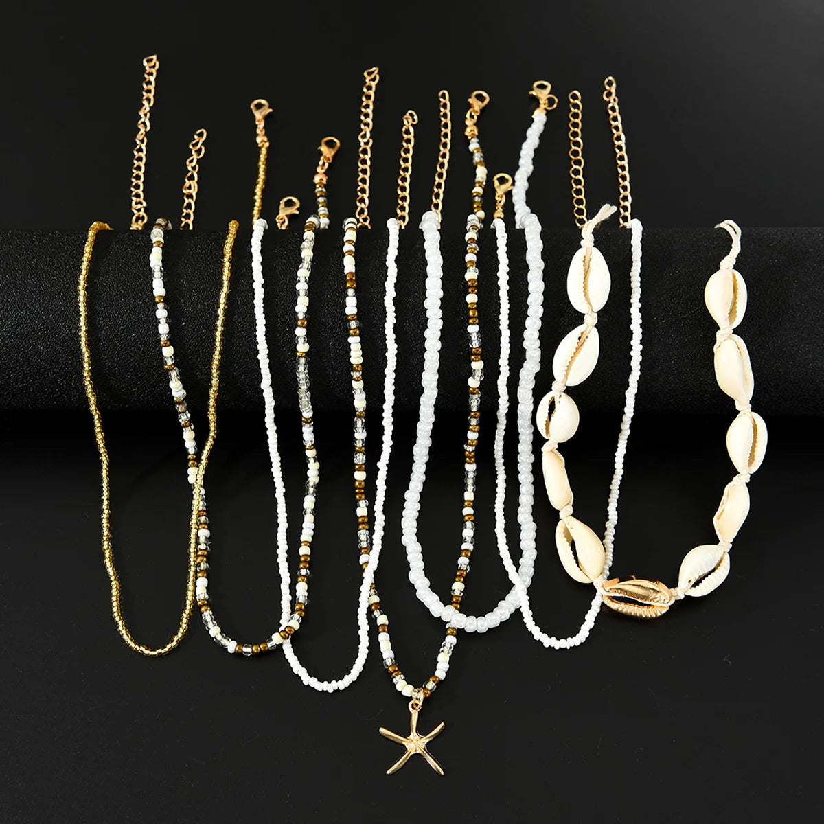 7Pcs/Set Boho Starfish Conch Rice Beads Pendant Necklace for Women Fashion White Color Multi layered Necklace Set Summer Jewelry