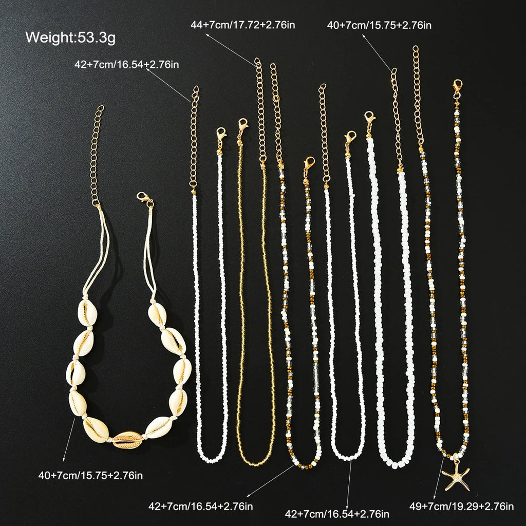 7Pcs/Set Boho Starfish Conch Rice Beads Pendant Necklace for Women Fashion White Color Multi layered Necklace Set Summer Jewelry